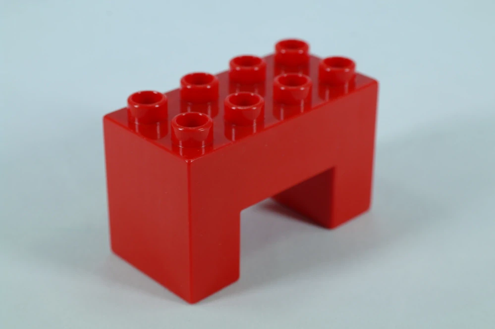 LEGO® DUPLO® kostka/cihla 2x4x2 s výřezem 2x2 - červená