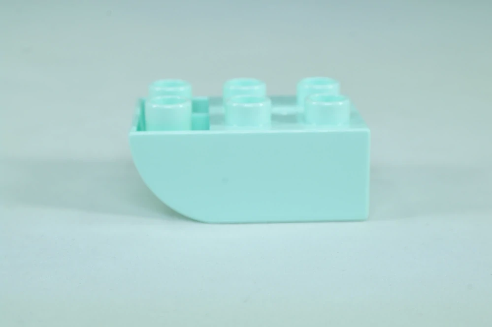 LEGO® DUPLO® cihla 2x3 se zakřivenou spodní částí