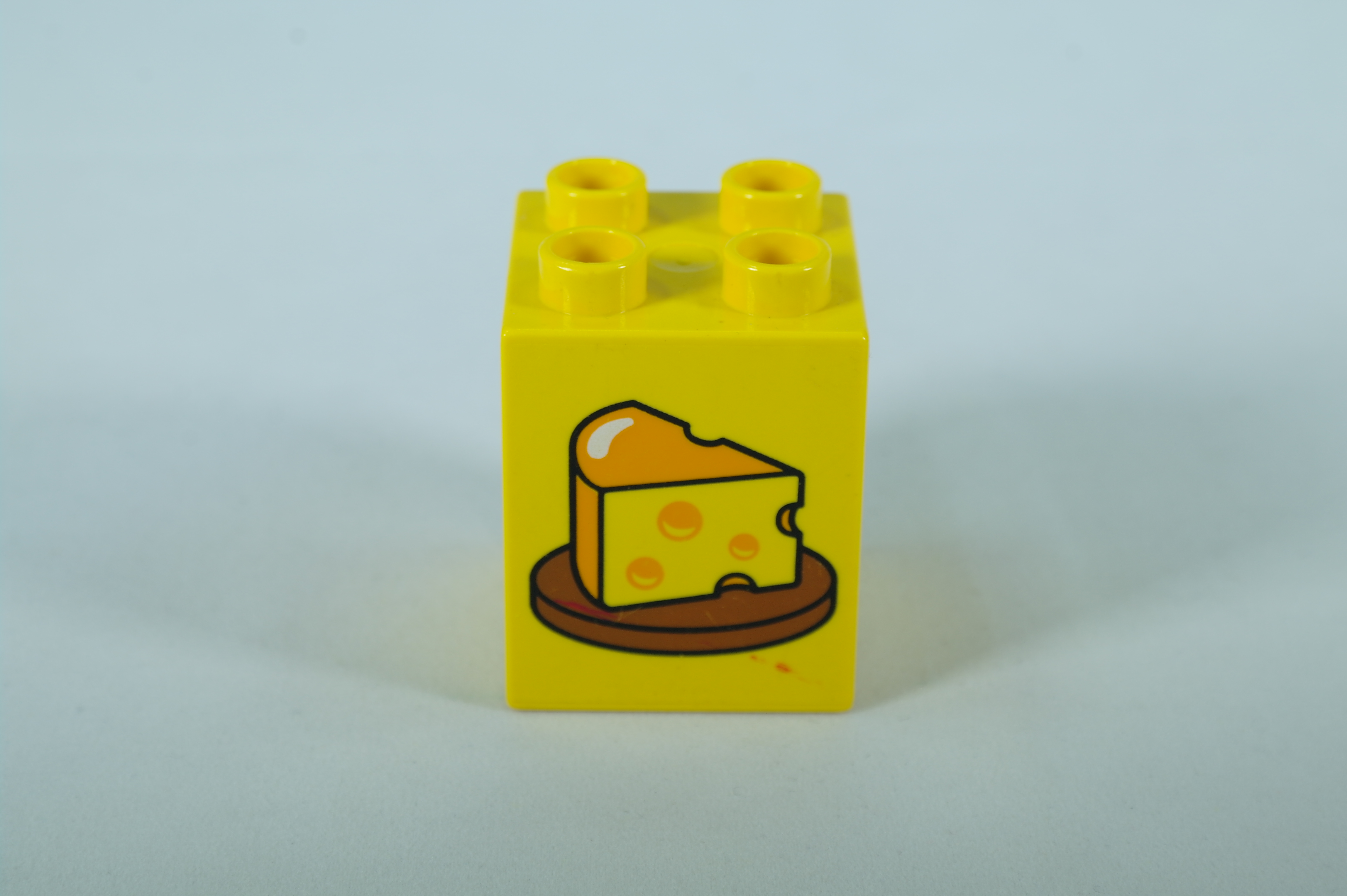 LEGO® DUPLO® cihla 2x2x2 se vzorem sýra na talíři
