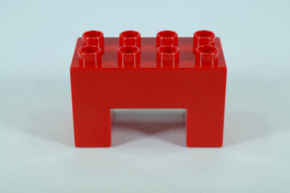 LEGO® DUPLO® kostka/cihla 2x4x2 s výřezem 2x2 - červená