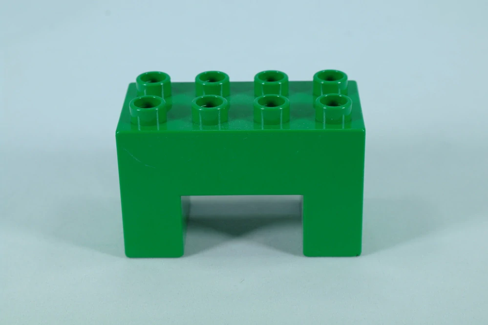 LEGO® DUPLO® kostka/cihla 2x4x2 s výřezem 2x2 - zelená