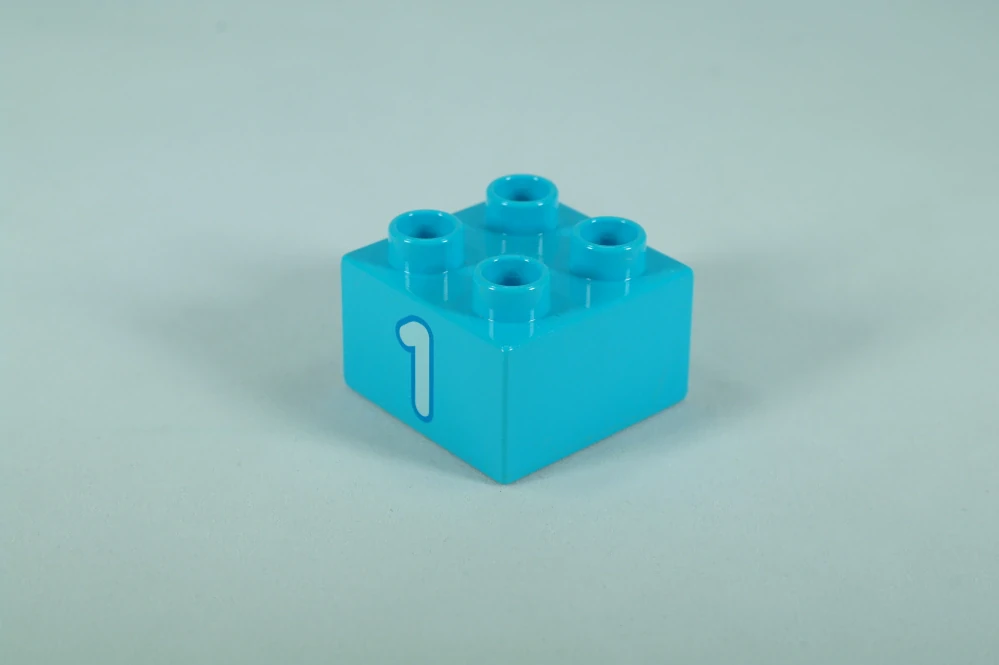 LEGO® DUPLO® cihla 2x2 s číslem 1, středně azurová