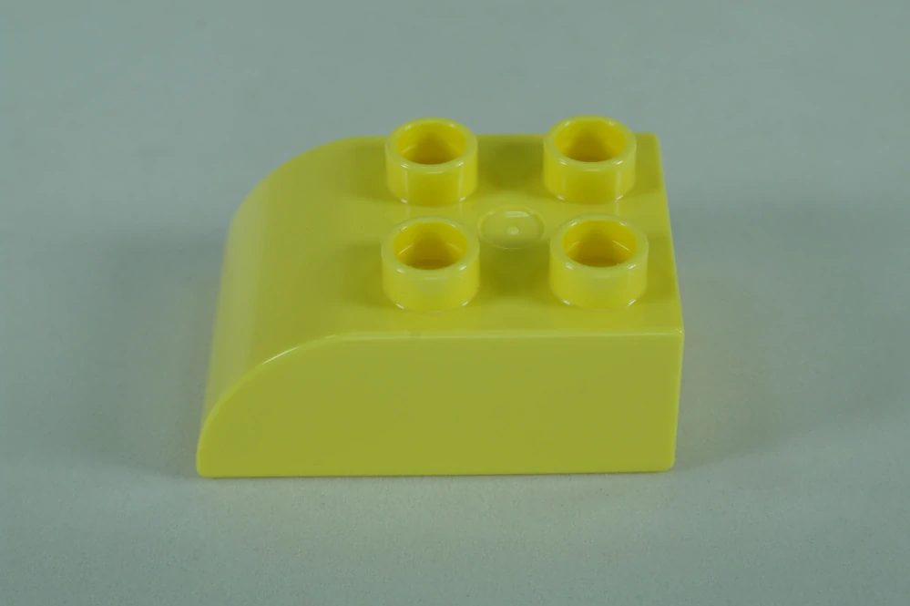 LEGO® DUPLO® cihla 2x3 se zakřivenou horní částí