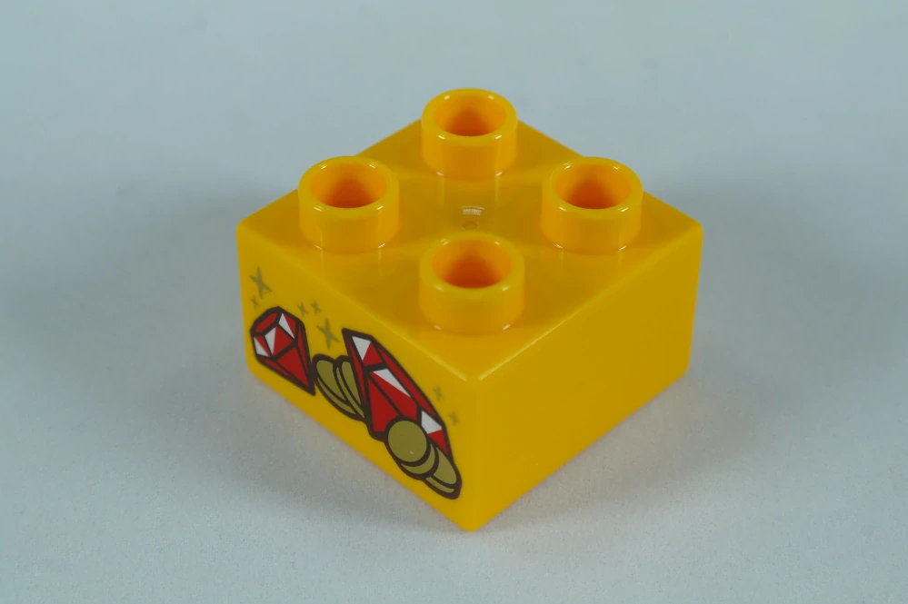 LEGO® DUPLO® cihla 2x2 se vzorem drahokamů a mincí