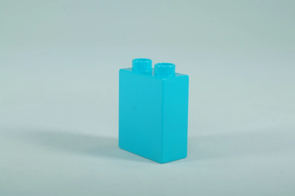 LEGO® DUPLO® kostka/cihla 1x2x2 středně azurová