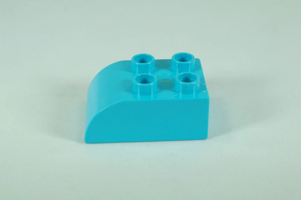 LEGO® DUPLO® cihla 2x3 se zakřivenou horní částí