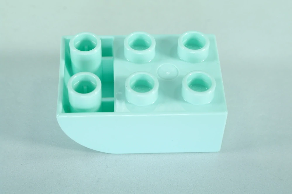 LEGO® DUPLO® cihla 2x3 se zakřivenou spodní částí