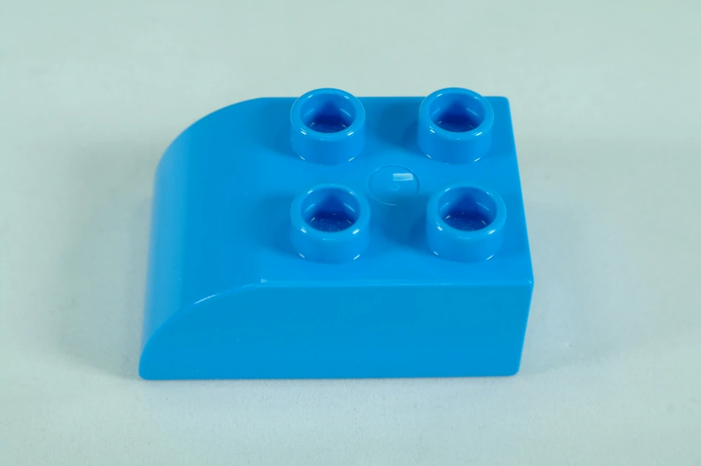 LEGO® DUPLO® cihla 2x3 se zakřivenou horní částí