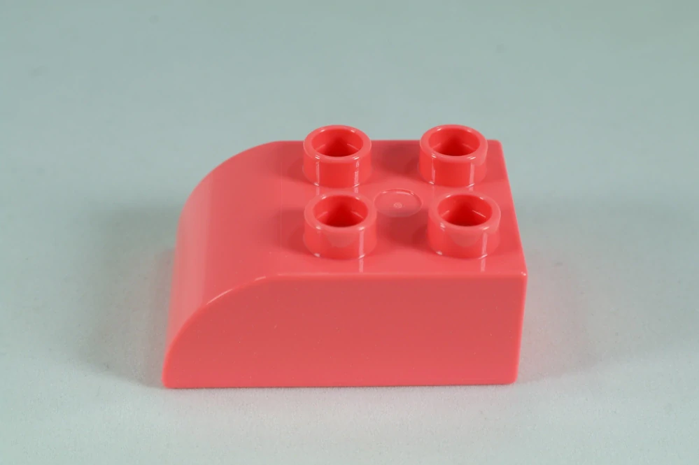 LEGO® DUPLO® cihla 2x3 se zakřivenou horní částí