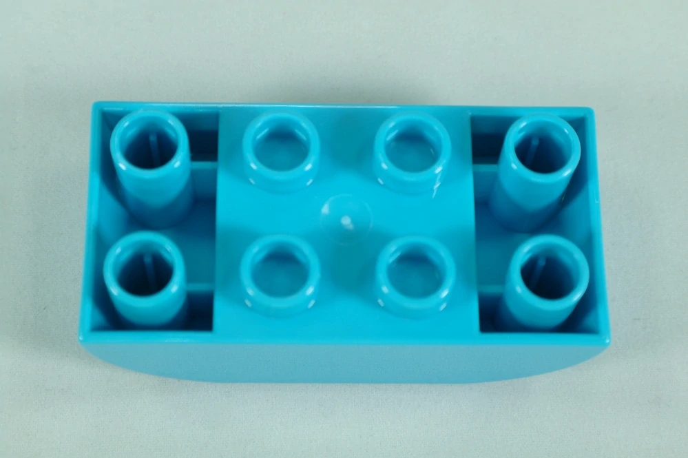 LEGO® DUPLO® cihla 2x4 sklon zakřivený obrácený dvojitý