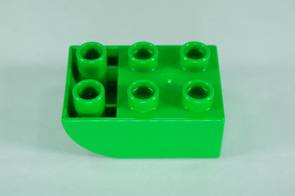 LEGO® DUPLO® cihla 2x3 se zakřivenou spodní částí