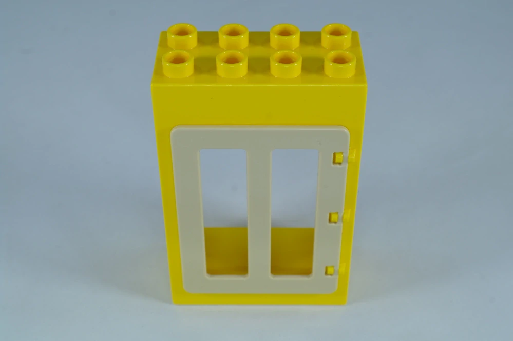 LEGO® DUPLO® okno, dveře. Dveřní/okenní rám 2x4x5 žlutý, tan okenice.
