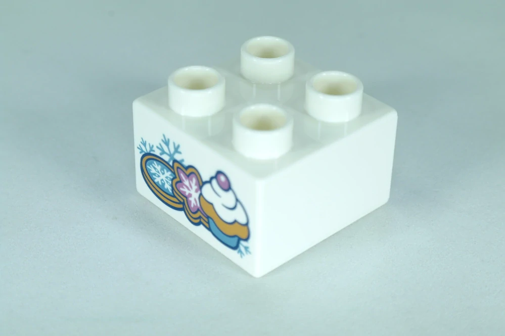 LEGO® DUPLO® cihla 2x2 se vzorem sušenek a dortíku