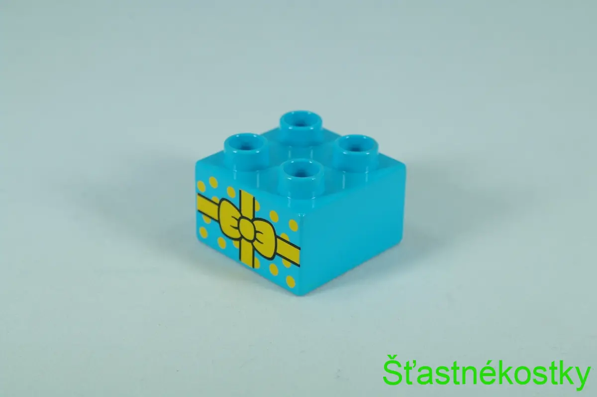 LEGO® DUPLO® cihla 2x2 se vzorem dárku se žlutou mašlí