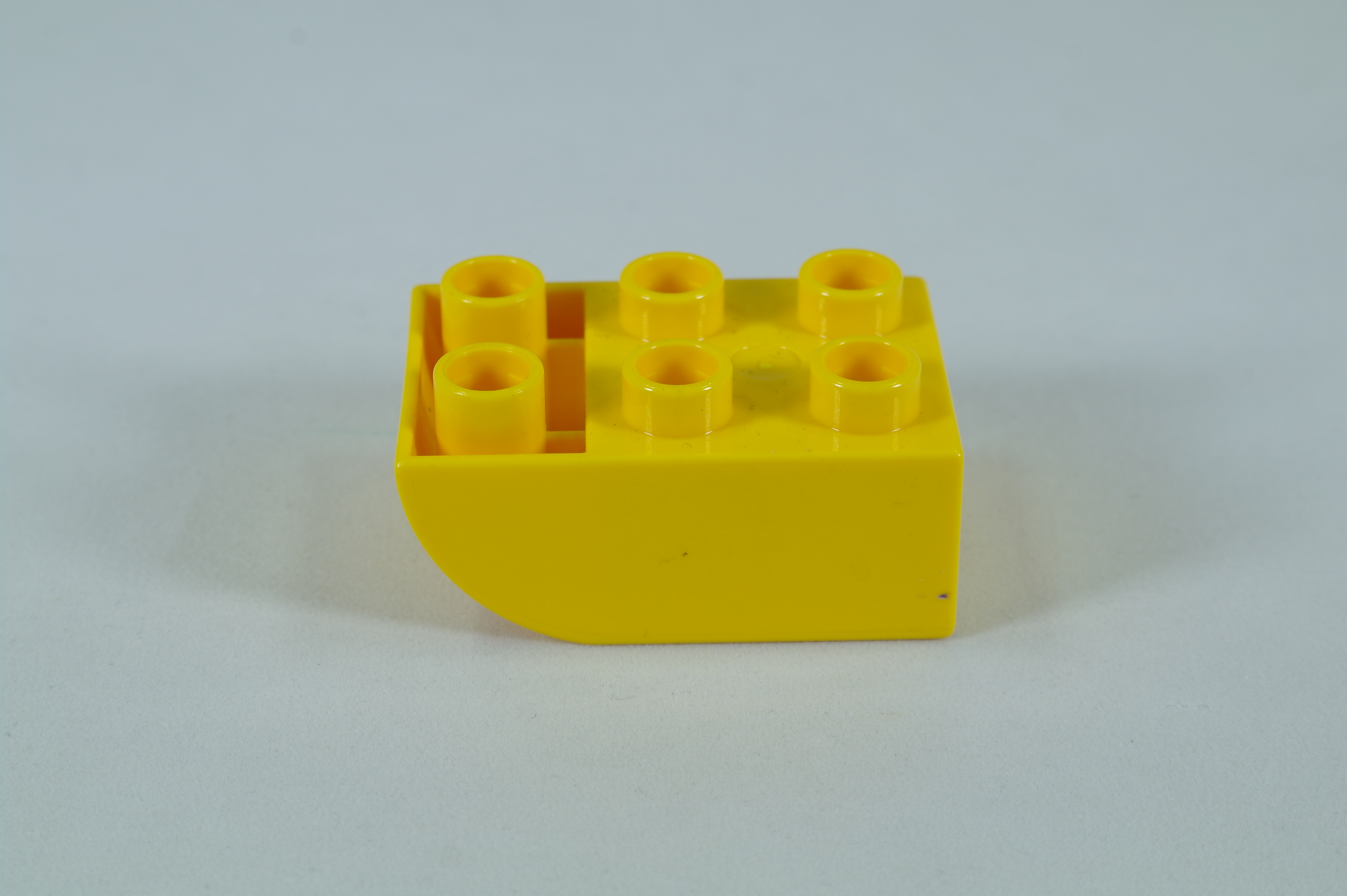 LEGO® DUPLO® cihla 2x3 se zakřivenou spodní částí