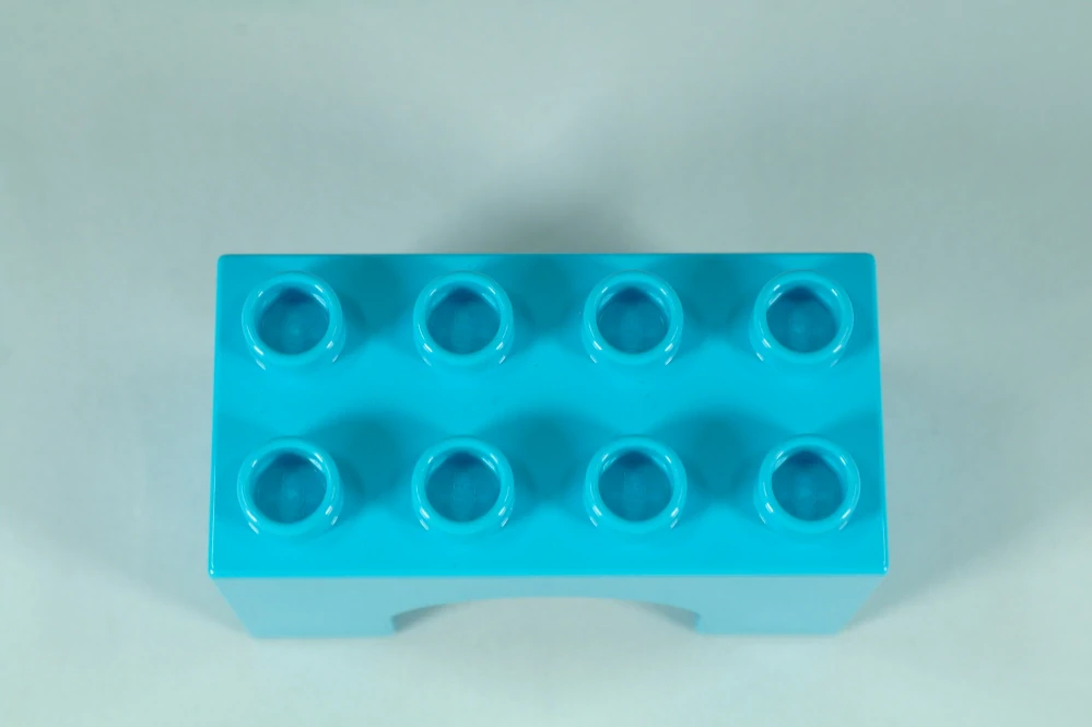 LEGO® DUPLO® kostka/cihla 2x4x2 oblouk - středně azurová