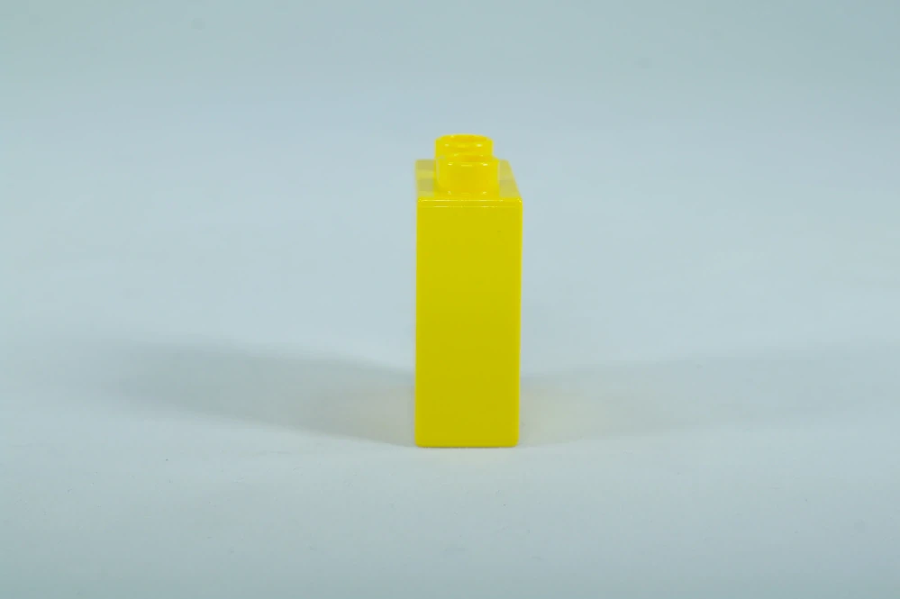 LEGO® DUPLO® kostka/cihla 1x2x2 žlutá