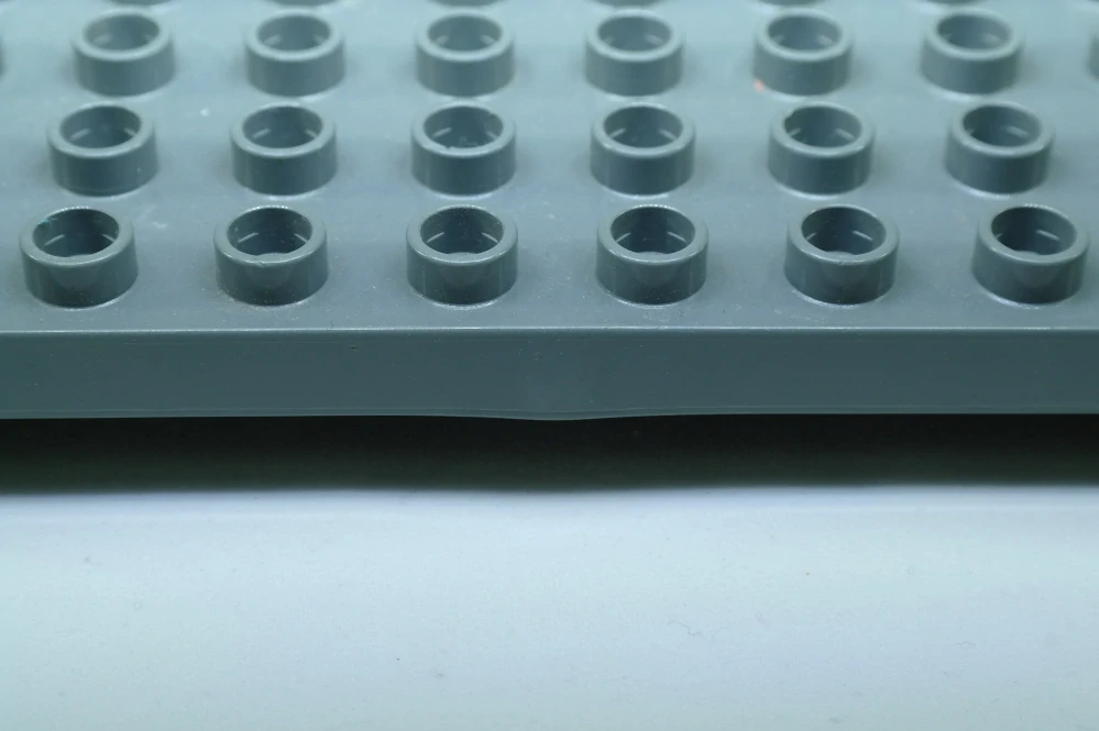 LEGO® DUPLO® deska 6x12 - tmavě šedá POŠKOZENÁ