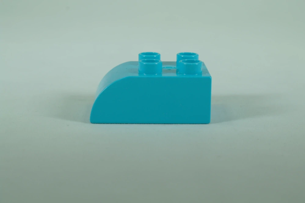 LEGO® DUPLO® cihla 2x3 se zakřivenou horní částí
