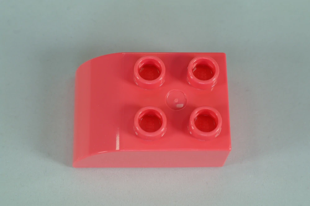 LEGO® DUPLO® cihla 2x3 se zakřivenou horní částí