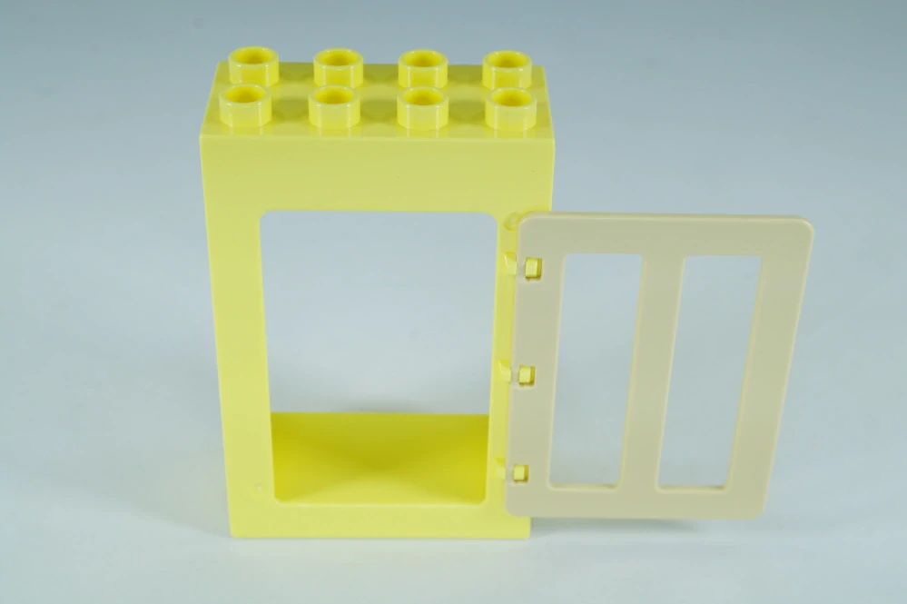 LEGO® DUPLO® okno, dveře. Dveřní/okenní rám 2x4x5 jasně světle žlutá + tan okenice