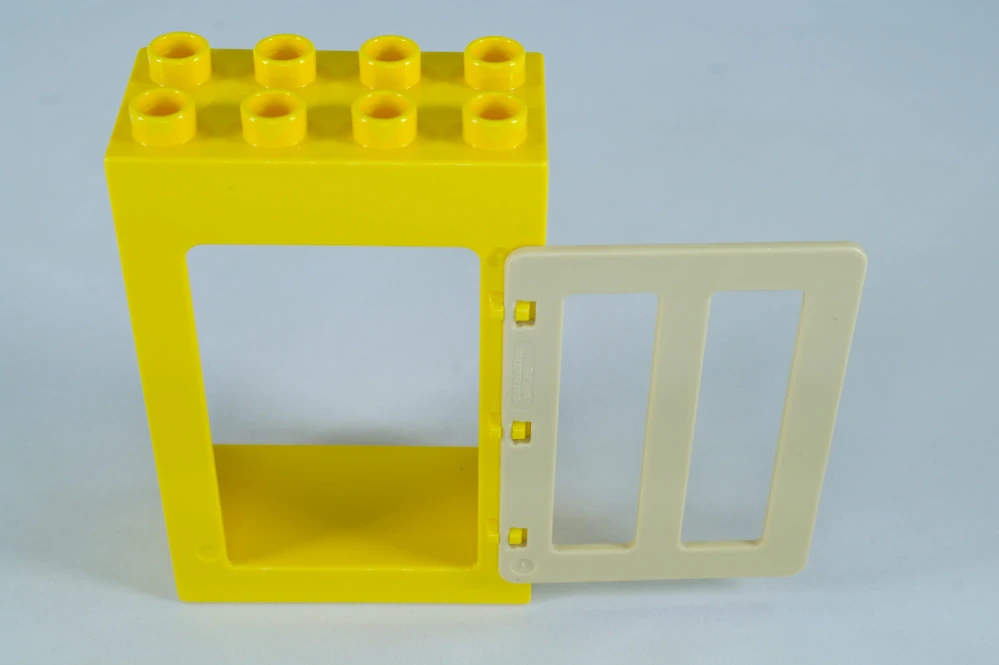 LEGO® DUPLO® okno, dveře. Dveřní/okenní rám 2x4x5 žlutý, tan okenice.