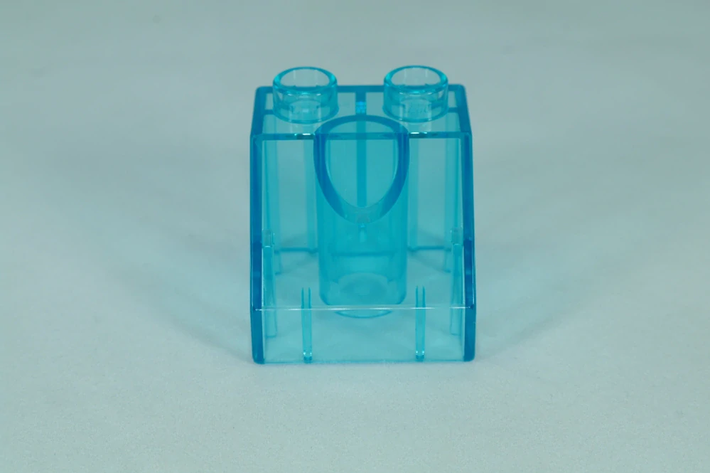 LEGO® DUPLO® cihla 2x2x1 1/2 sklon 45° - trans. světle modrá