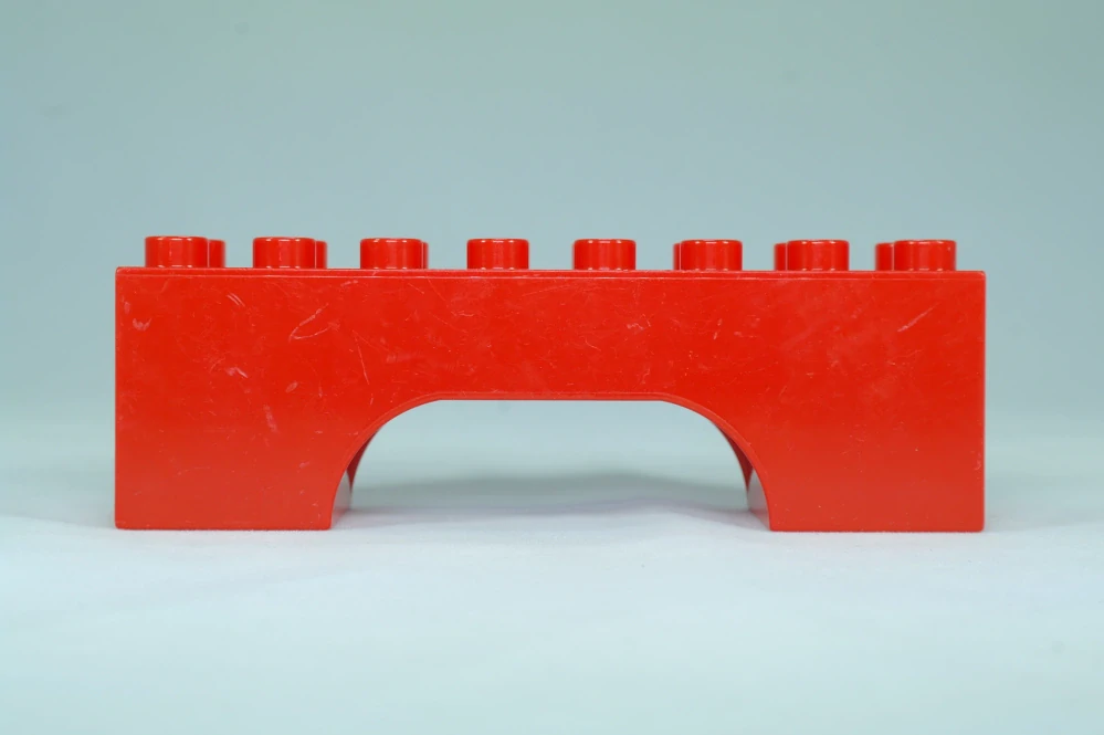 LEGO® DUPLO® cihla 2x8x2 oblouk - červená