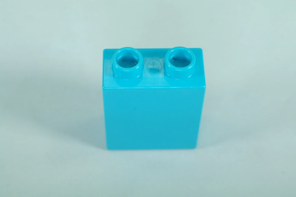 LEGO® DUPLO® kostka/cihla 1x2x2 středně azurová