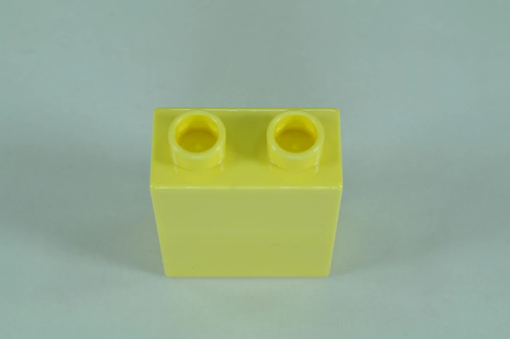 LEGO® DUPLO® kostka/cihla 1x2x2 jasně světle žlutá