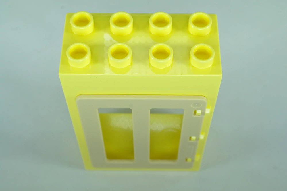 LEGO® DUPLO® okno, dveře. Dveřní/okenní rám 2x4x5 jasně světle žlutá + tan okenice
