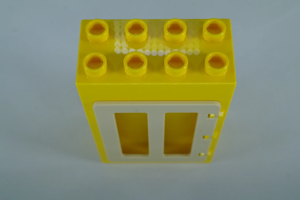 LEGO® DUPLO® okno, dveře. Dveřní/okenní rám 2x4x5 žlutý, tan okenice.