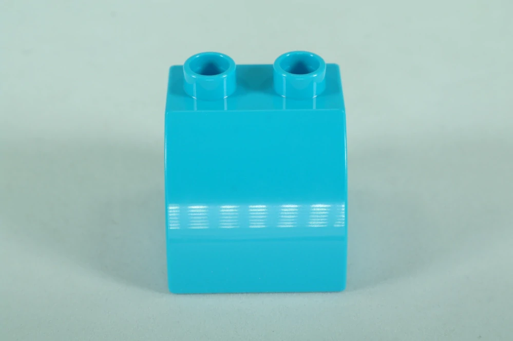 LEGO® DUPLO® cihla 2x2x1,5 zaoblená - s chlapcem na jedné straně a dívkou na druhé