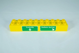 LEGO® DUPLO® kostka/cihla 2x10 se vzorem "Truckville"a"Radiator Spring"