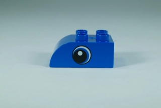 LEGO® DUPLO® cihla 2x3 s okem a zakřivenou horní částí - modrá