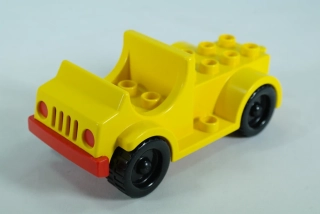 LEGO® DUPLO® auto 2x4 ložnou plochou a nášlapy - žluté